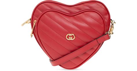 red gucci handbag heart|Gucci heart shaped bag.